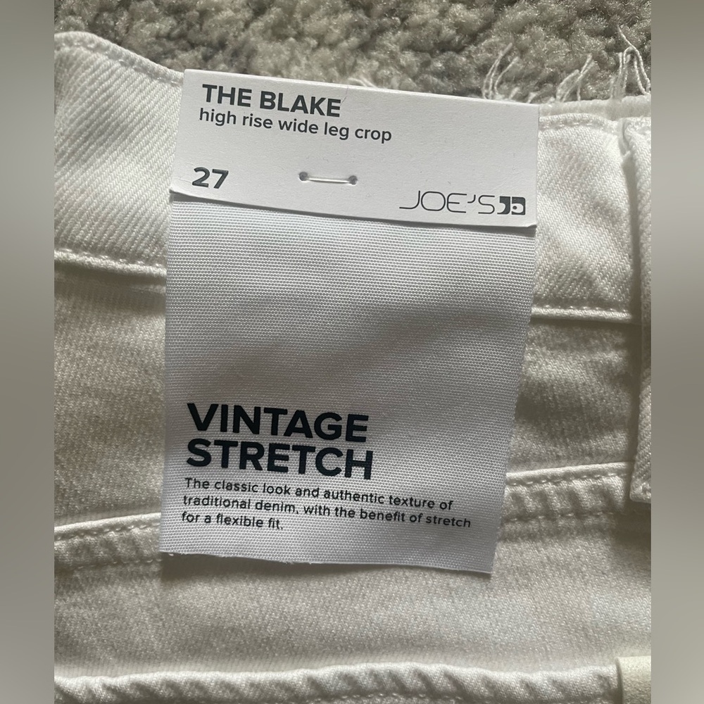 New, never worn with tags on, white size 27